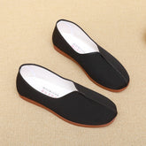 Zapatos de lona Tai Kung negros de alto rendimiento con suela de tendón para hombre